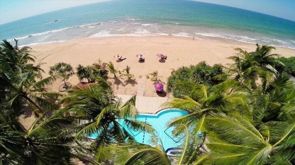 Картинка Whispering Palms 3*