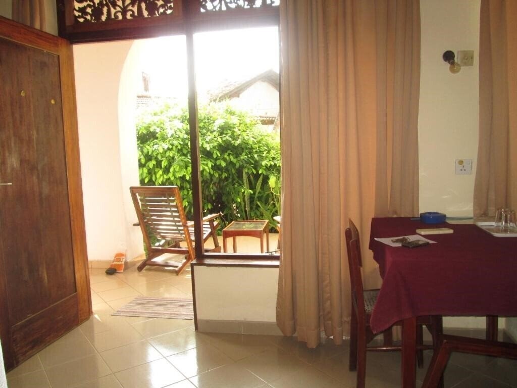 Фотография Tandem Guest House 2*