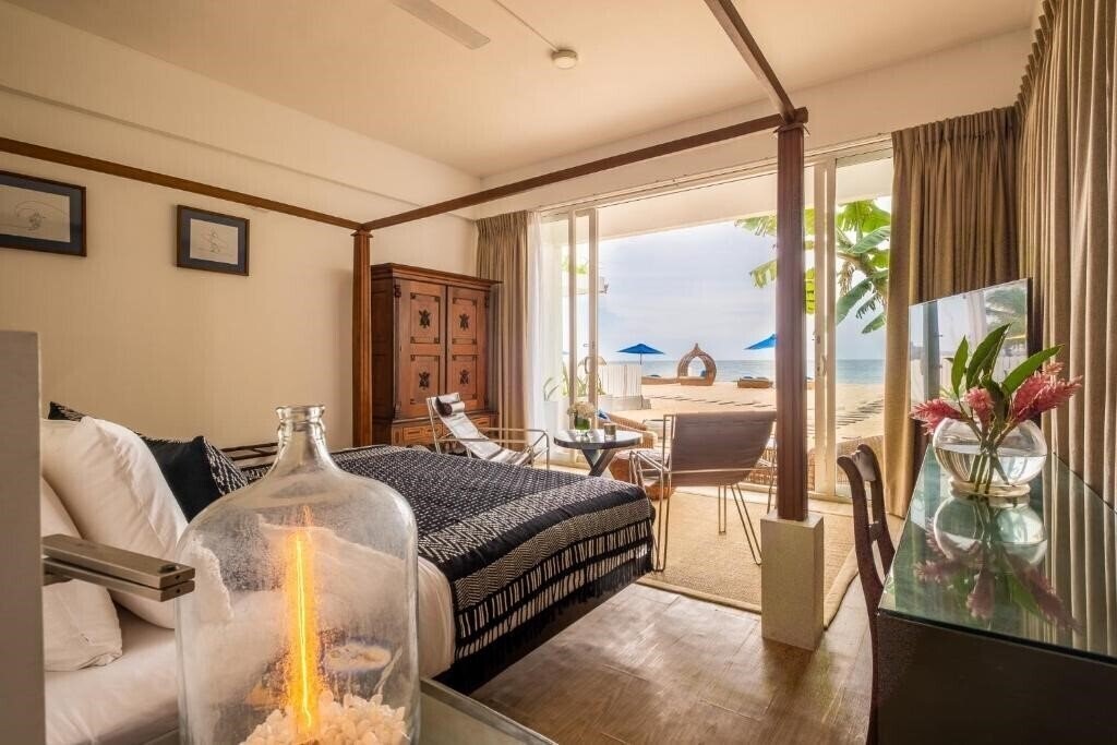 Отель The Beach House 5*