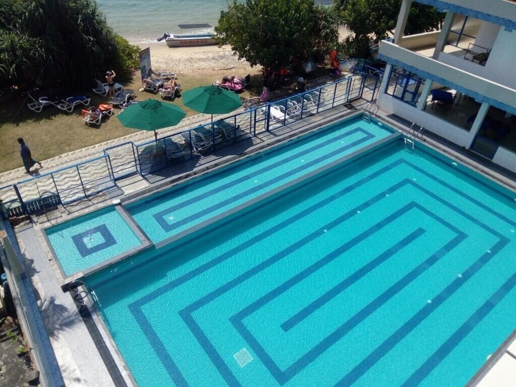 Отель Vista Paradise Beach Resort 4*