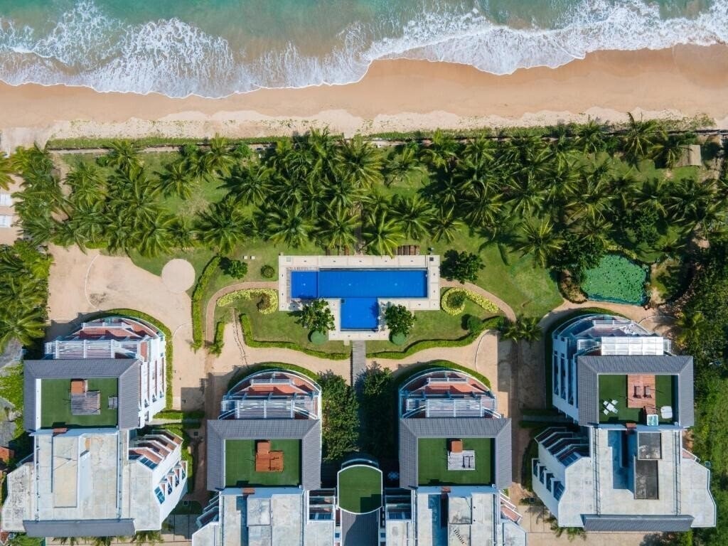 Фотография Oceanfront Condos Nilaveli Apartment 4*