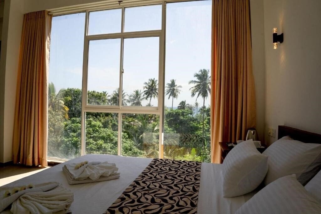 Фото Tevins Place Unawatuna 2*