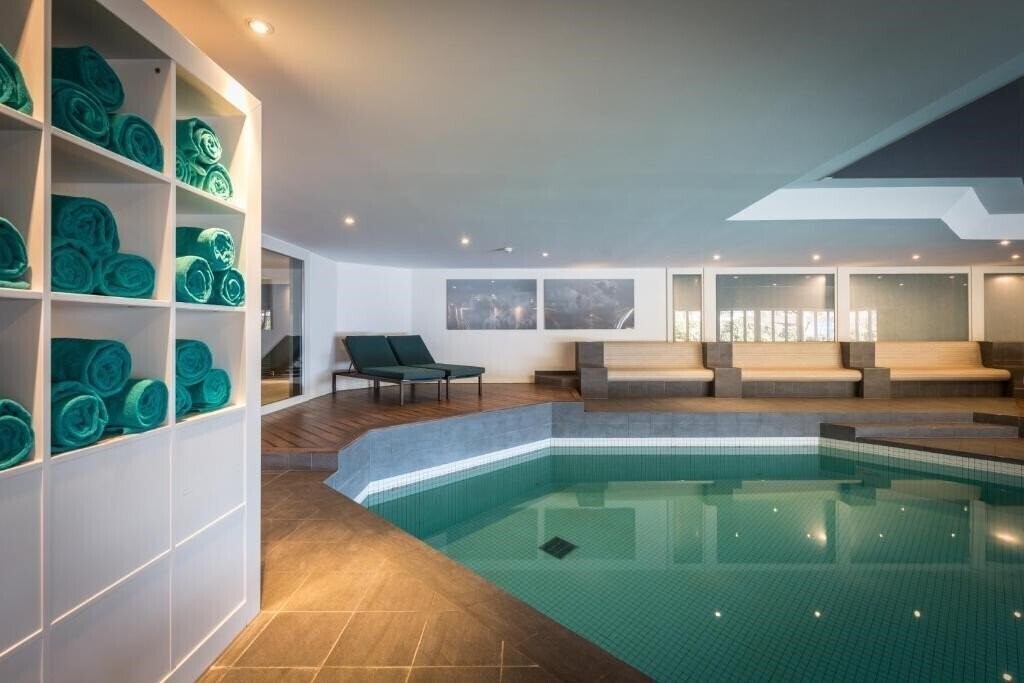 Фотографія HUUS Gstaad Hotel 4*