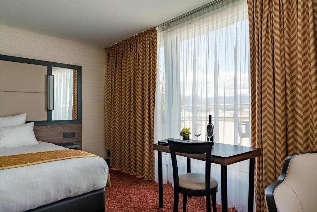 Фотография Nash Suites Airport Hotel 4*