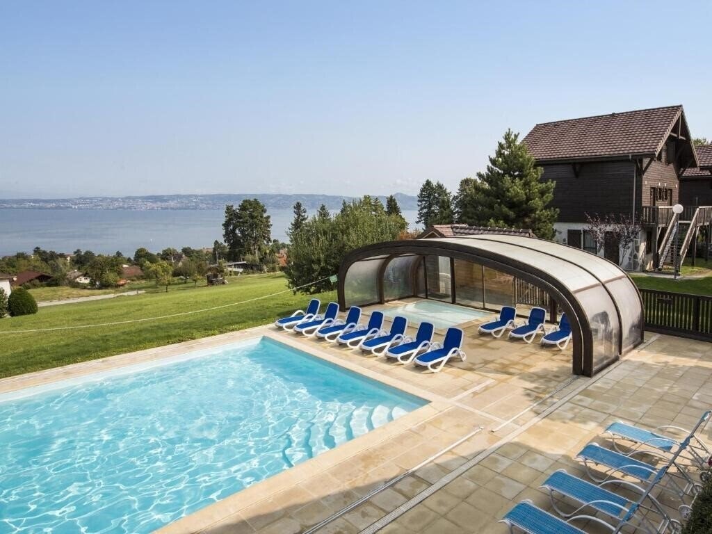 Отель Residence Odalys Les Chalets d'Evian 3*