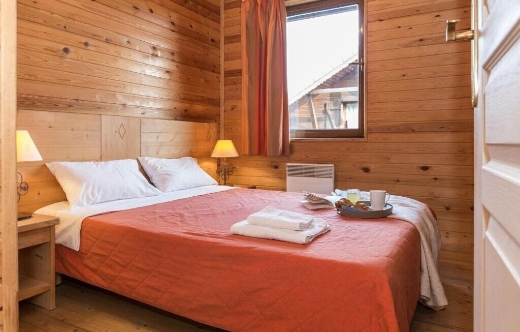 Фото Residence Odalys Les Chalets d'Evian 3*