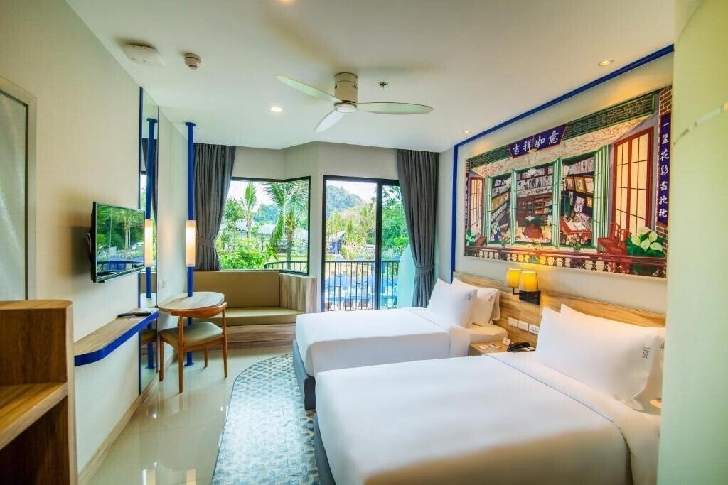 Фотографія Holiday Style Ao Nang Beach Resort 3*