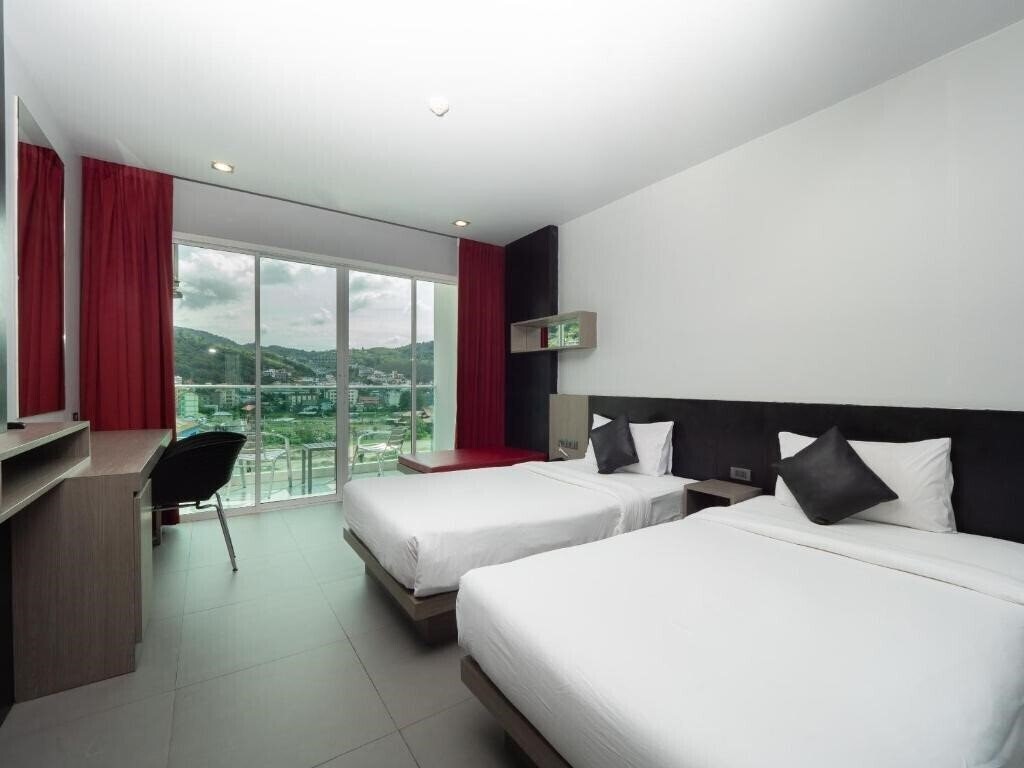 Фото Neon Patong Hotel 4*