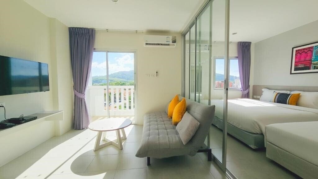 Фотографія Recenta Suite Phuket Suanluang 4*