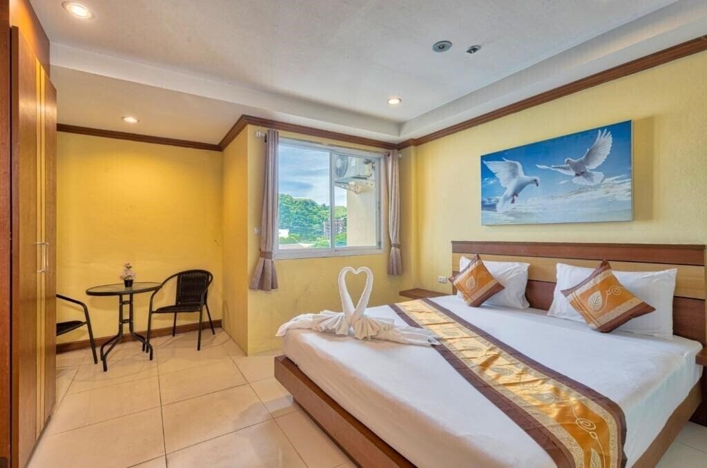 Фото TJ Patong Hotel 3*