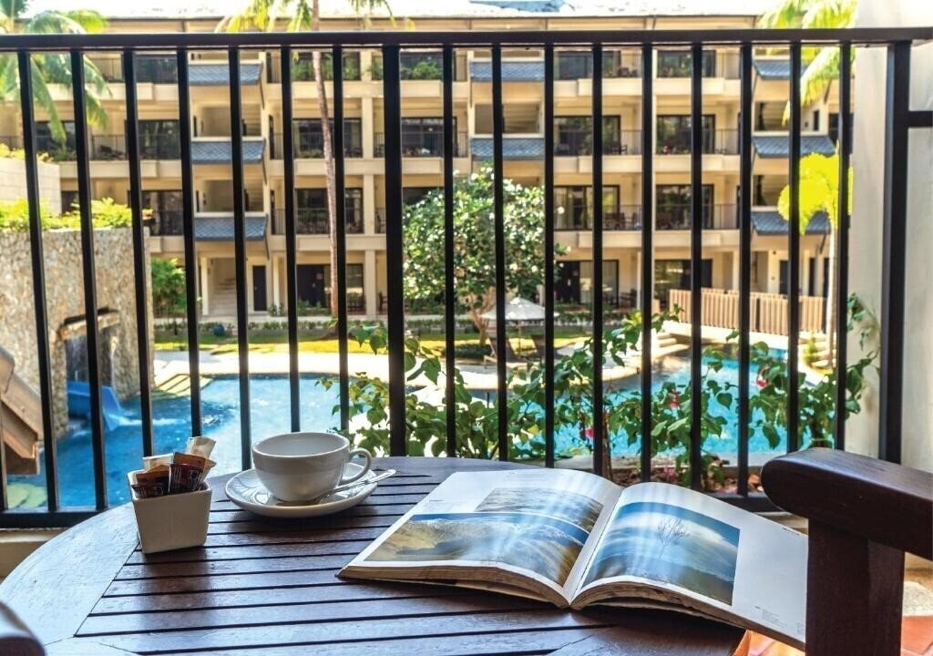 Фото Swissotel Resort Phuket (ex. Courtyard Phuket At Kamala Beach) 4*