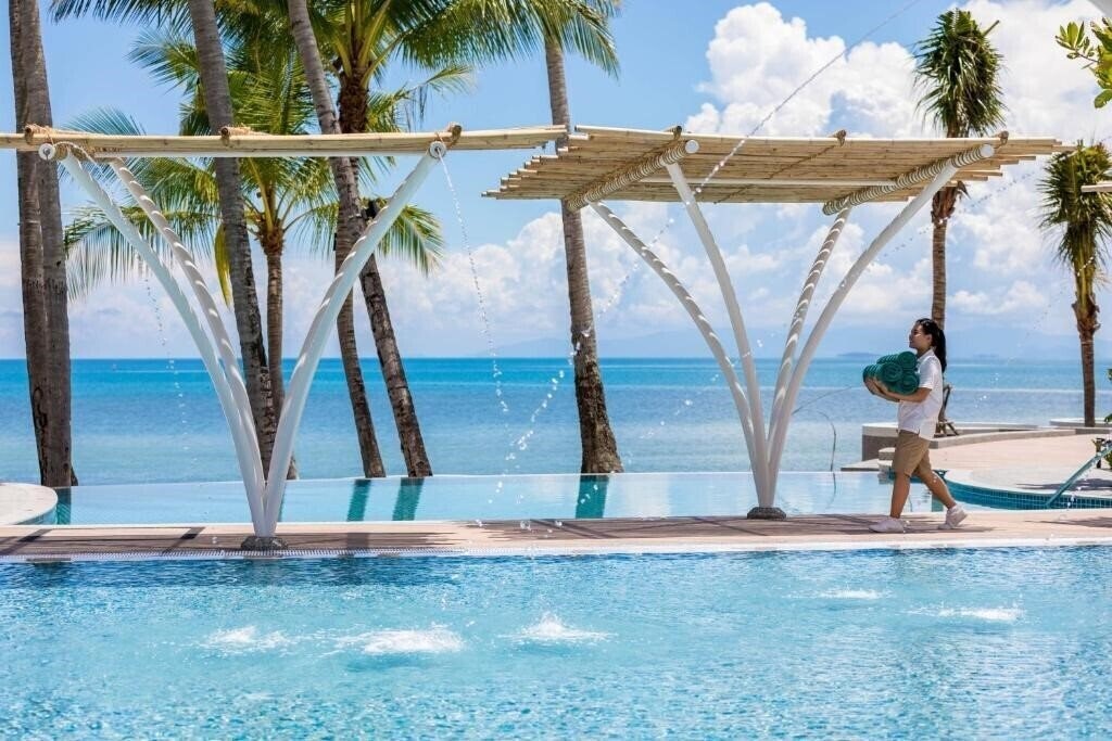 Изображение Outrigger Koh Samui Beach Resort - SHA Extra Plus (ex. Manathai Koh Samui, Akaryn Samui Resort) 5*