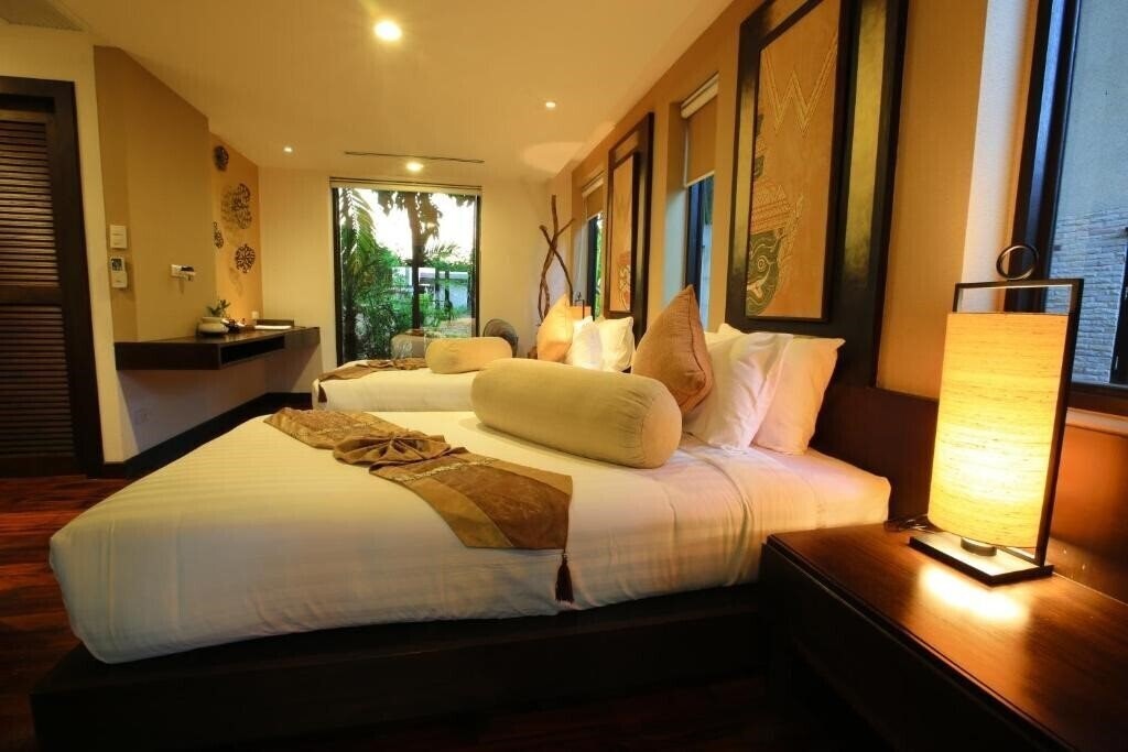 Фото Niramaya Villa & Wellness Resort 4*