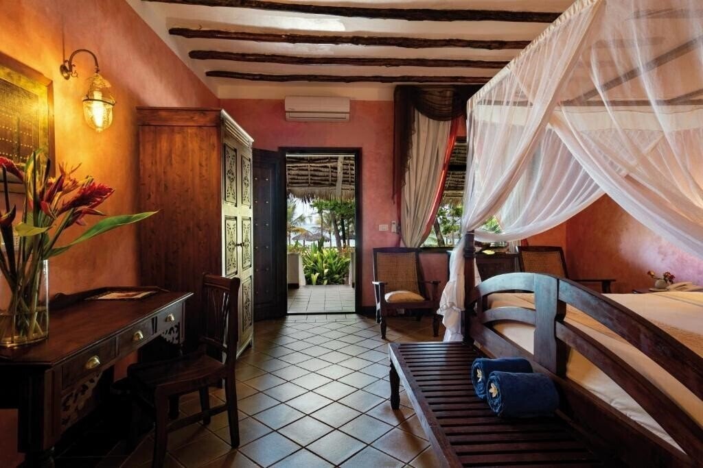 Фото Dongwe Beach Club & Resort 4*