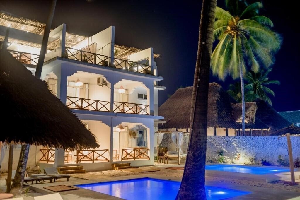 Фотография Coco Rise Villas by Hostly 4*