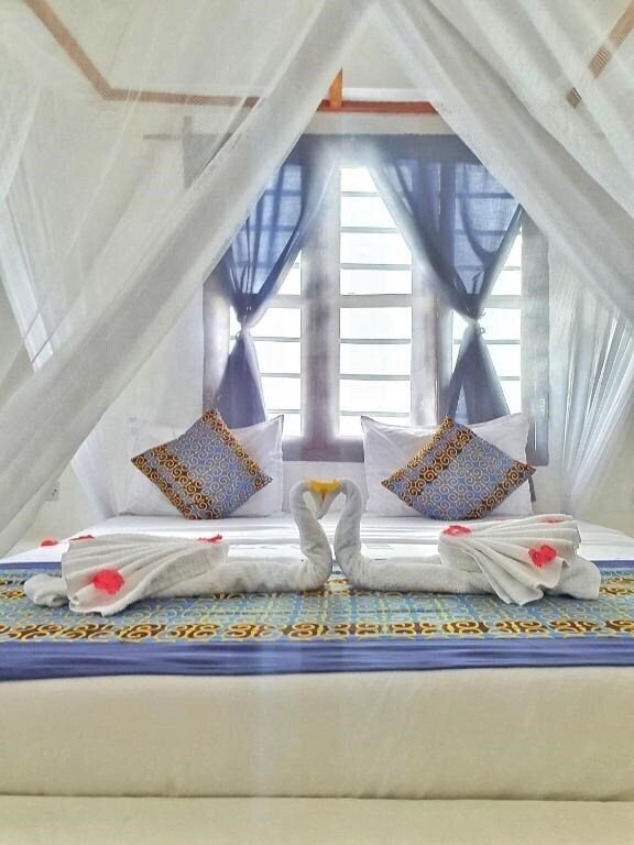 Отель Blue Palm Zanzibar 4*