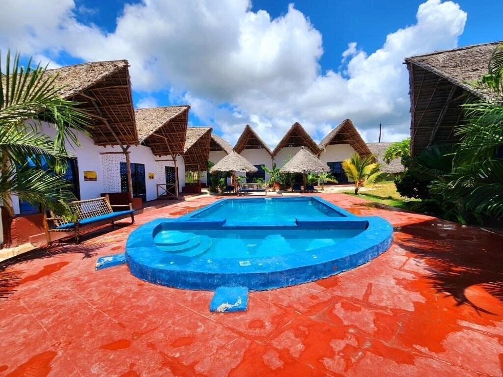 Фото Mkeka Spice Lodge 4*