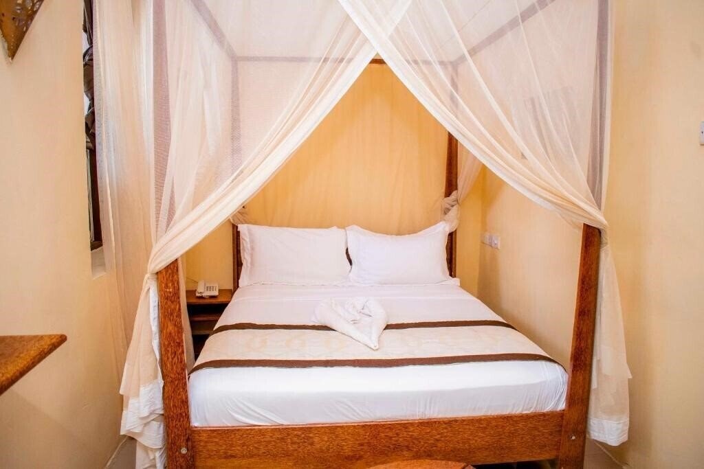 Фото The Island Stone Town Hotel 2*