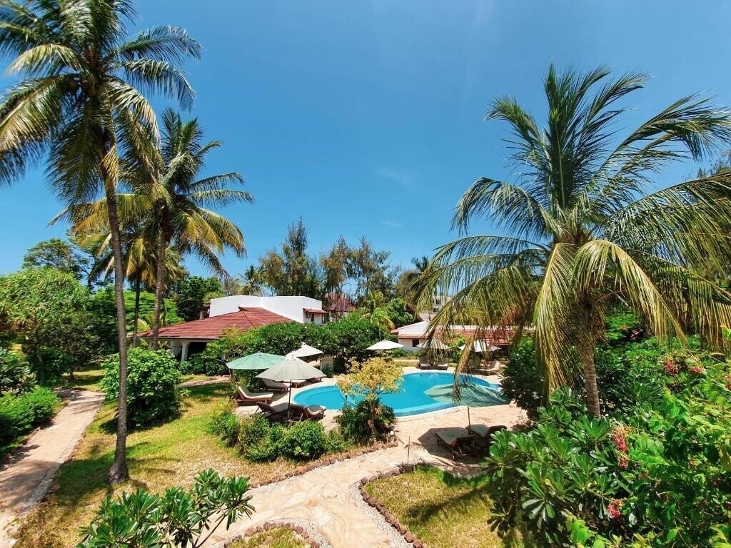 Фото Flame Tree Cottages 3*