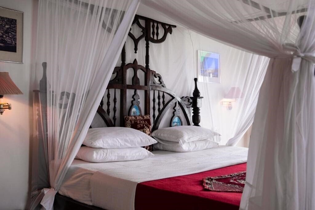 Фотография Tembo House 4*