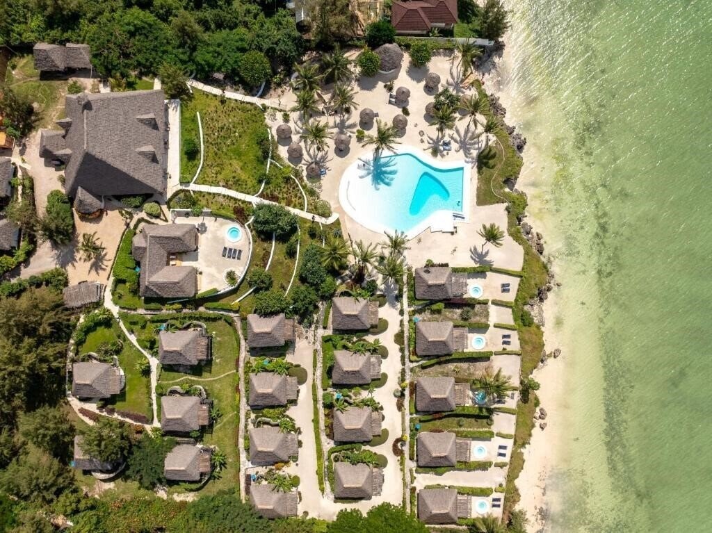Фото Zanbluu Beach Hotel 4*