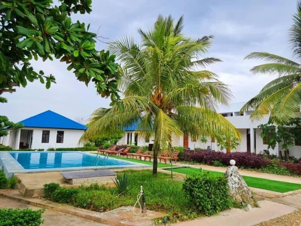 Фото Kigwedeni Villas 3*
