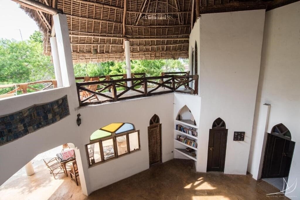 Фотографія Casa Umoja Guesthouse 3*