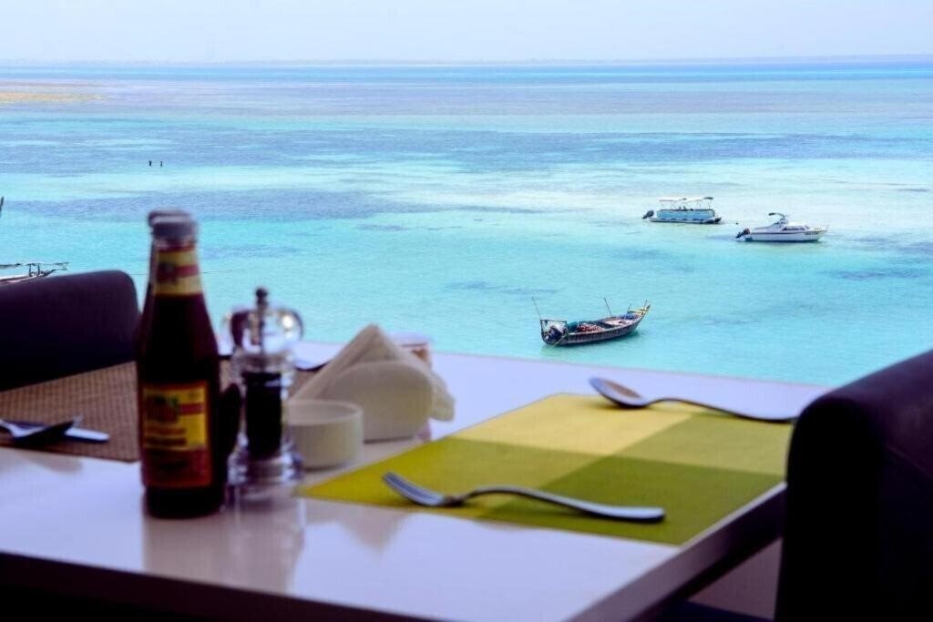 Фото Sunseabar Beach Hotel Kendwa 4*