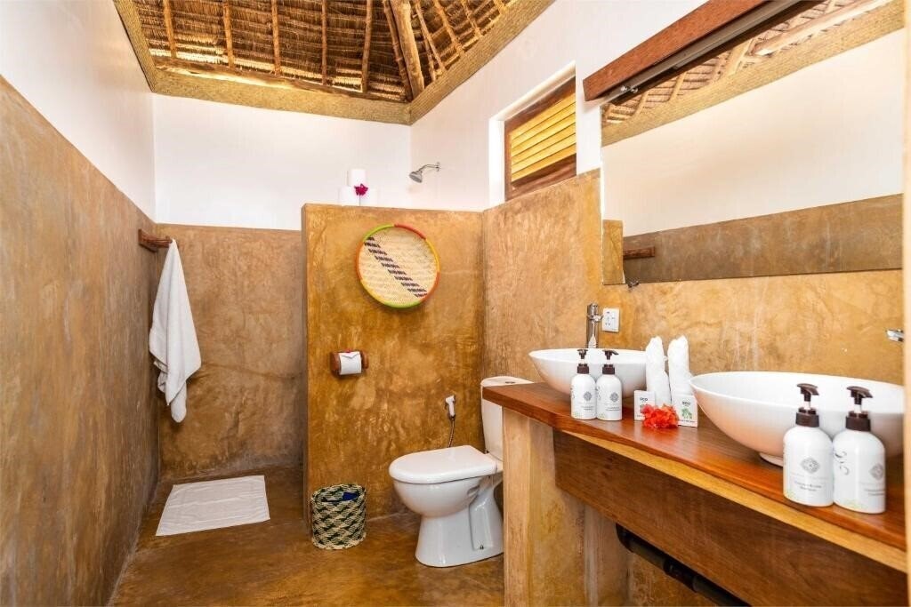 Фотография Zanzibar Sunrise At Bandas 4*