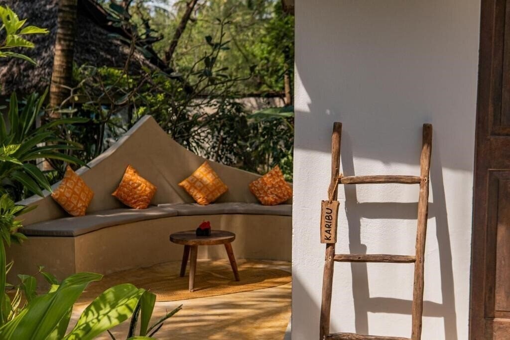 Фото The Waterfront Zanzibar Beach Hotel 4*