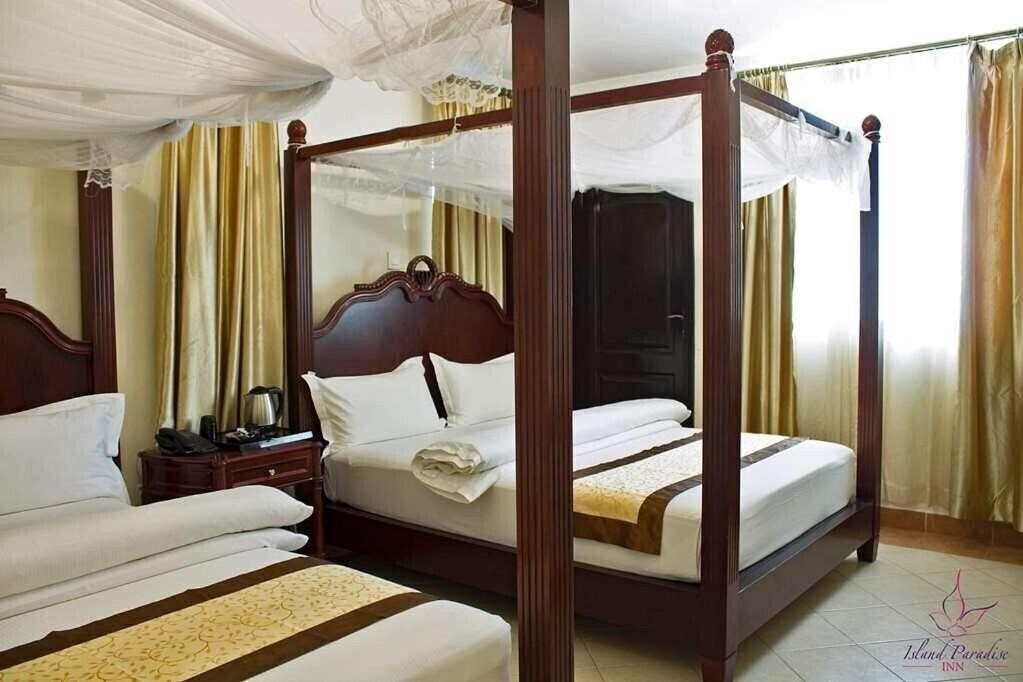 Фото Island Paradise Inn 3*