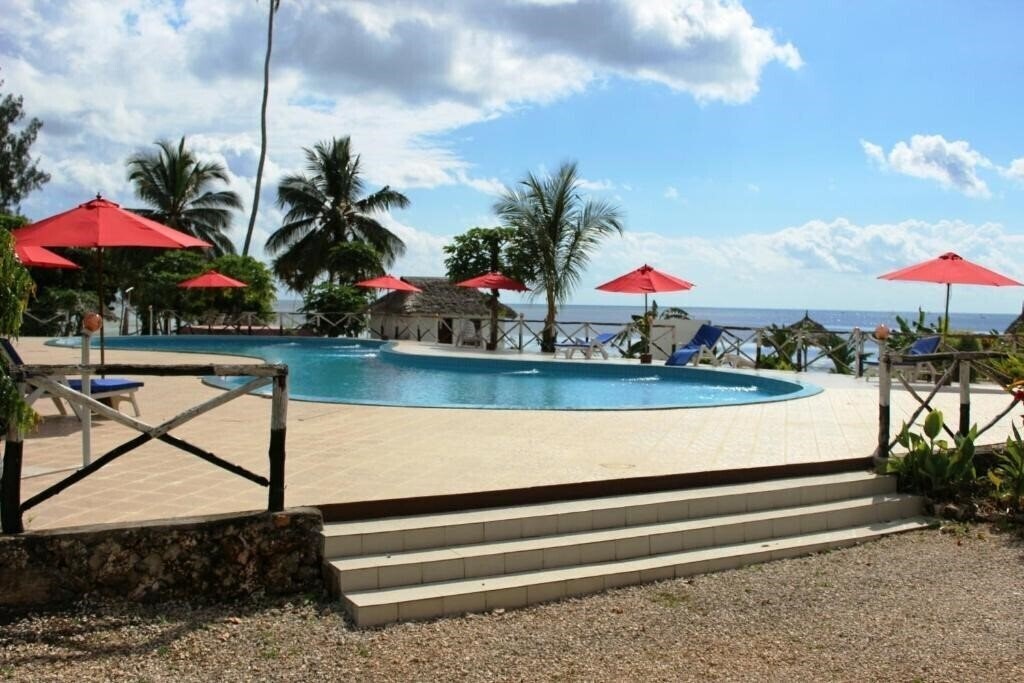 Отель Coconut Tree Village Beach Resort 3*