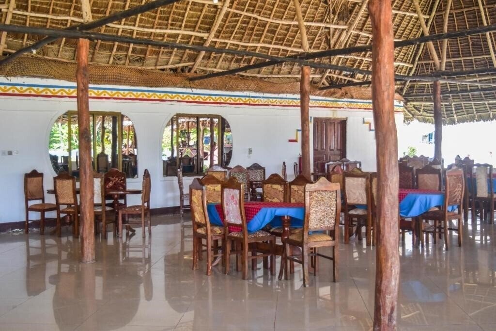 Изображение Coconut Tree Village Beach Resort 3*
