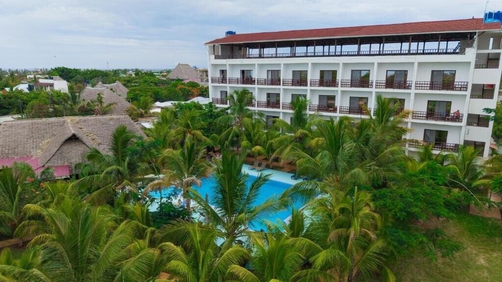 Отель Malika Nungwi Hotel 4*