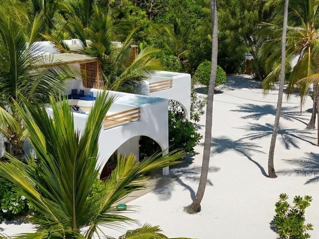 Фото Kijani Beach Villas 4*