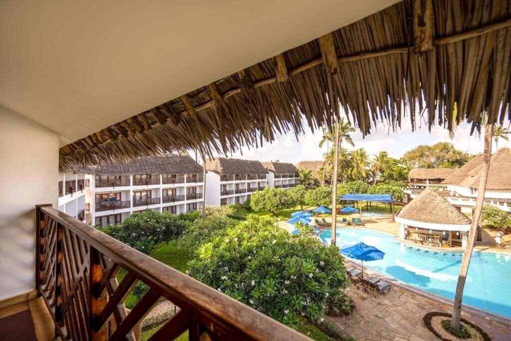 Фото Nungwi Beach Resort by Turaco (ex. Doubletree By Hilton Nungwi) 4*