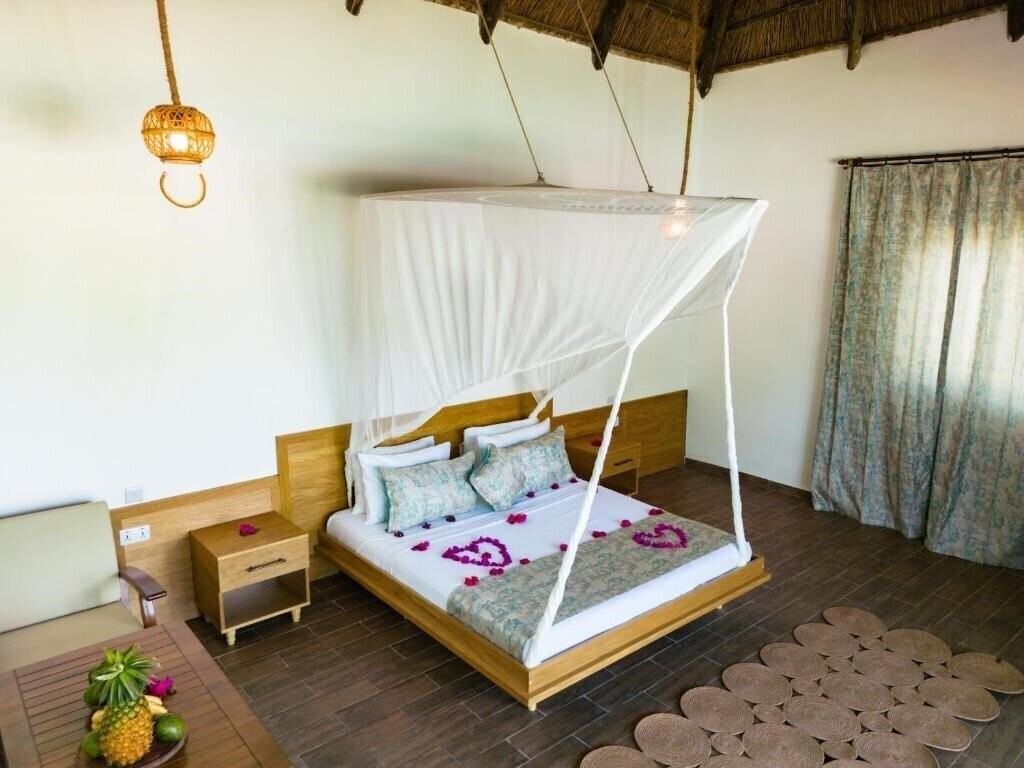 Фото Turkuaz Beach Zanzibar 5*