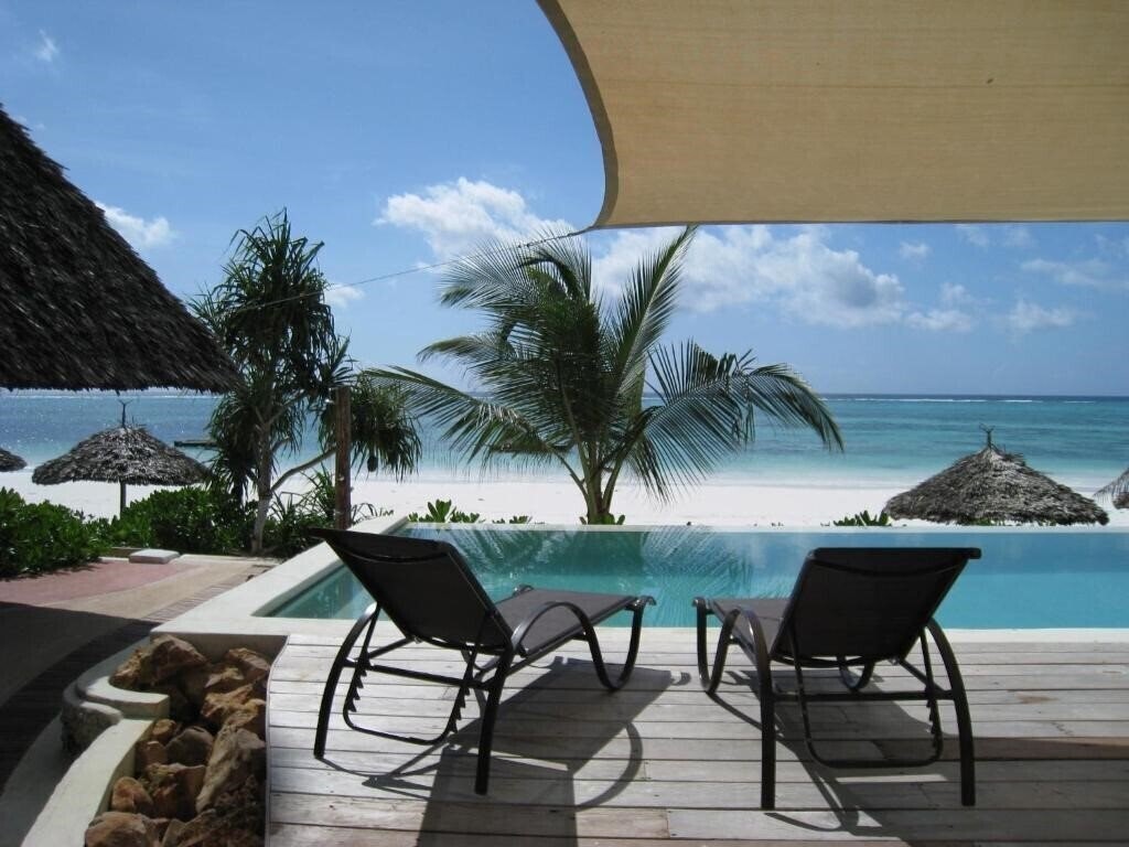 Отель Sunshine Azure Zanzibar Beach 4*