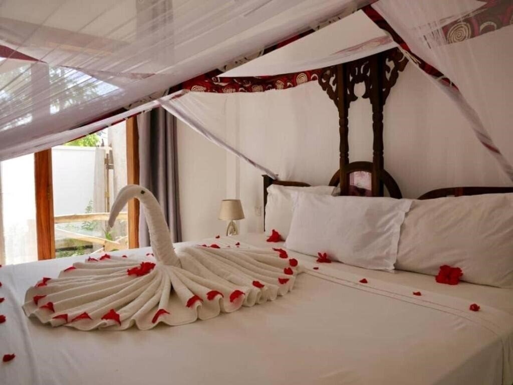 Фото Boutique Ocean View Nungwi 4*