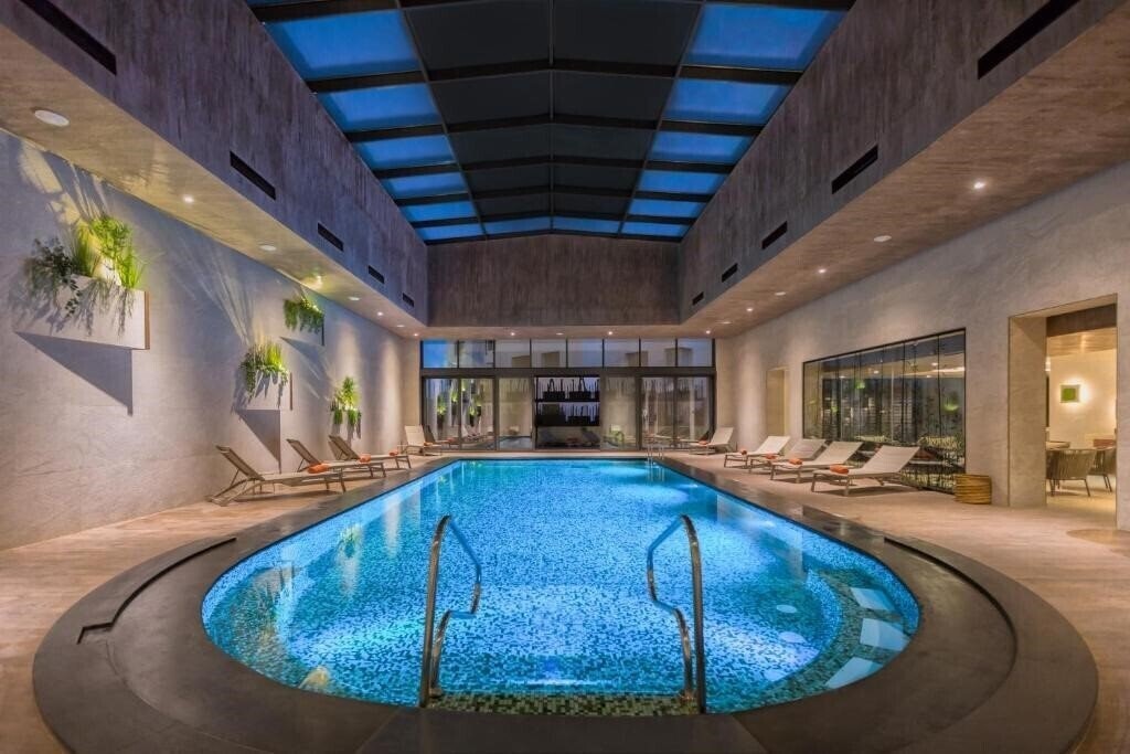 Фото Movenpick Hotel Du Lac Tunis 5*
