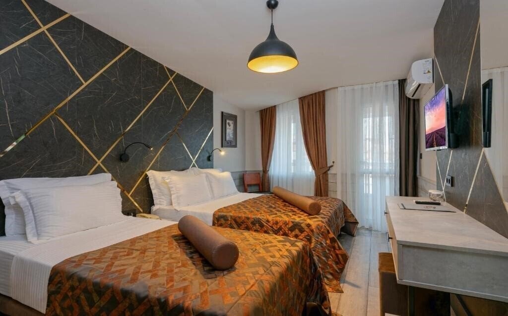 Фотографія Monart City Hotel 4*