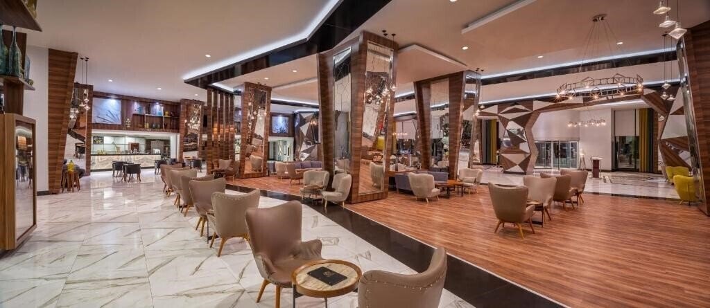 Фотографія Delphin Botanik Platinum Hotel 5*