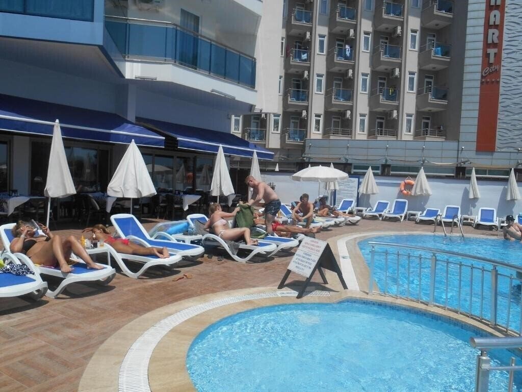 Фотографія Parador Beach Hotel 3*