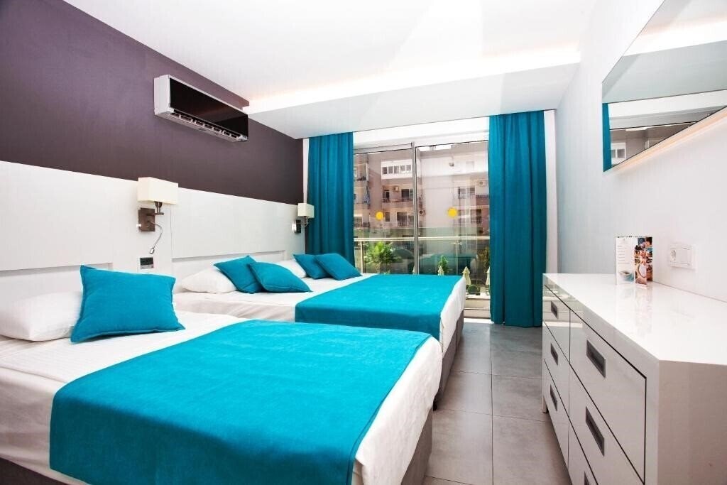 Фото Green Garden Residence Suites 5*