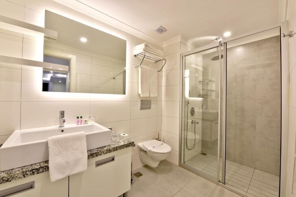 Фотографія Green Garden Residence Suites 5*