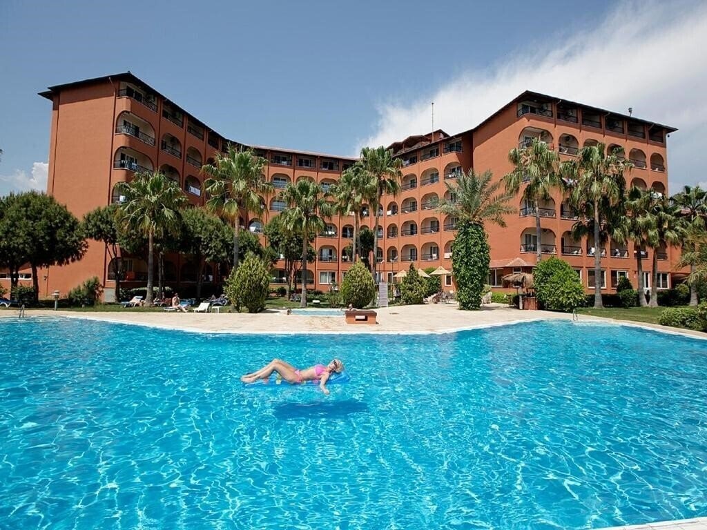 Фотографія Club Turtas Beach Hotel 4*