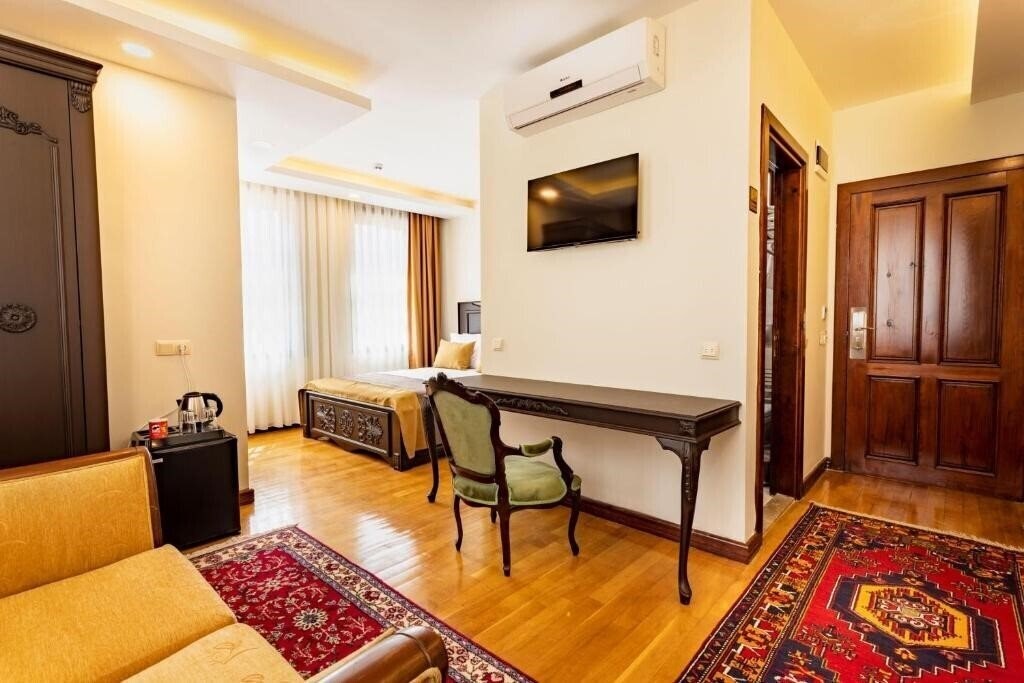 Изображение Woo Town Suites 3*
