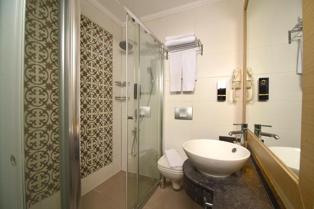 Фотографія Gazetta Suites 4*