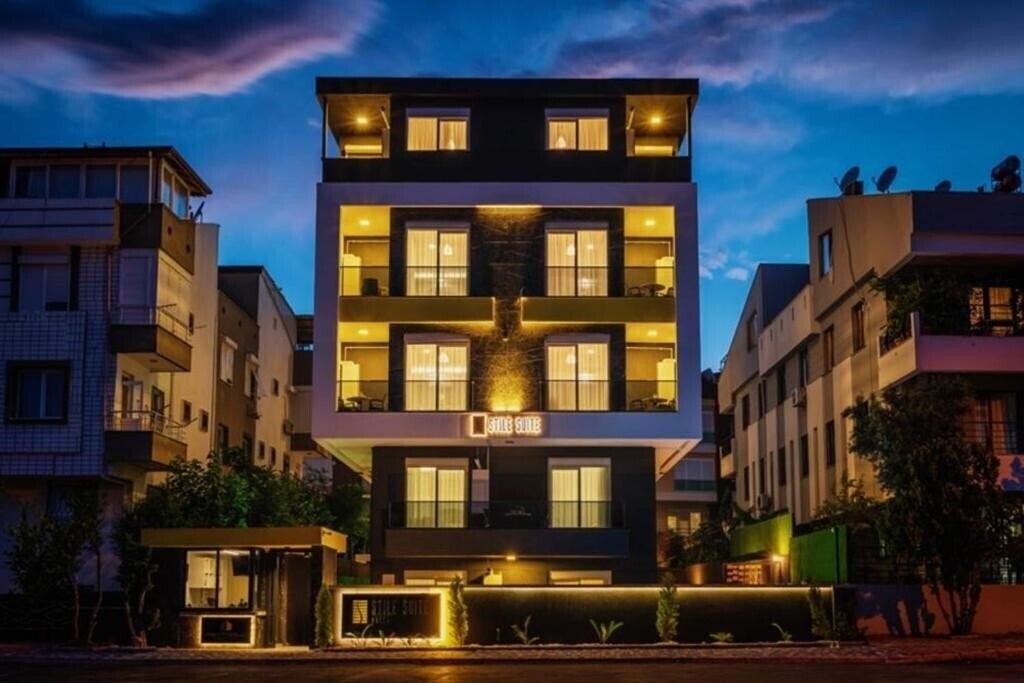 Отель Stile Suite Hotel 4*