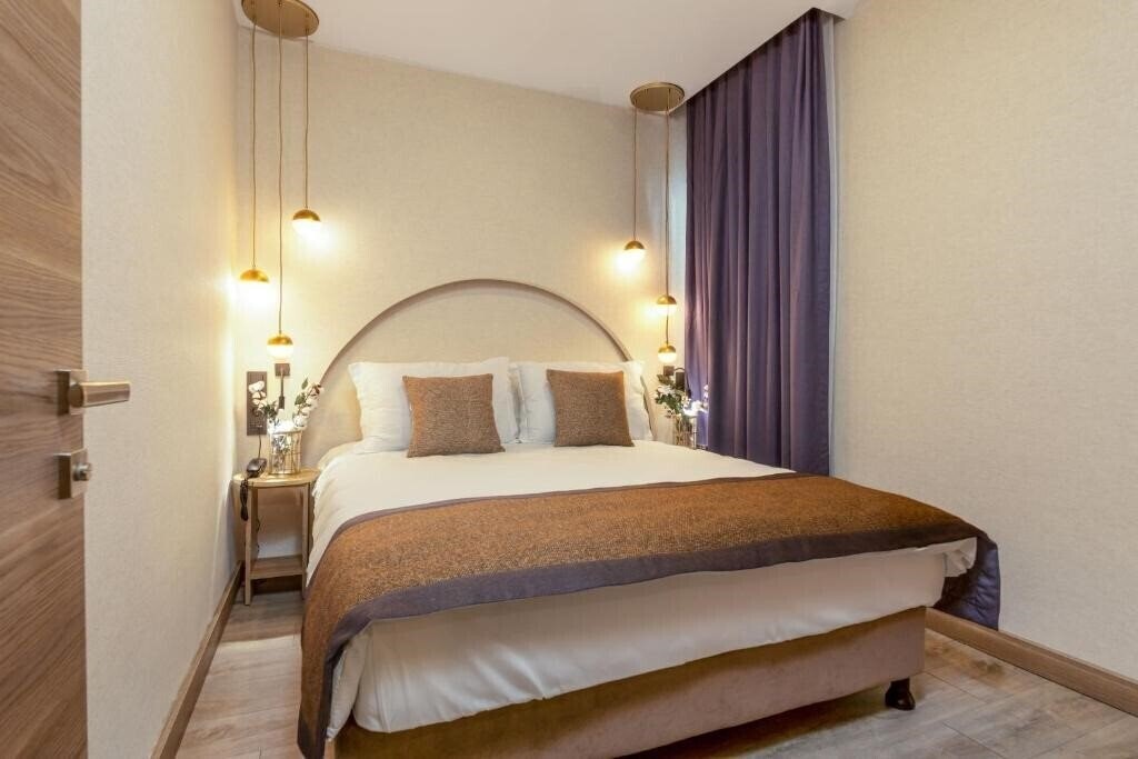 Фотографія Ema Houses 4*